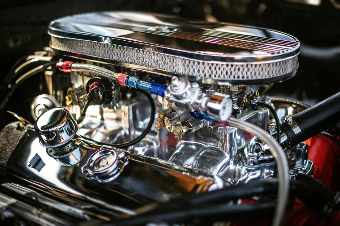 Engine repair — clean automotive engine bay in a repair shop
